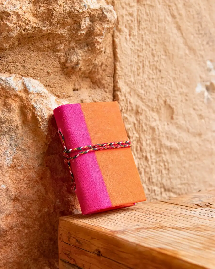 agenda fucsia y naranja tamaño pequeño